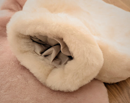 Sheepskin cover for hot water bottle (hot water bottle not included)